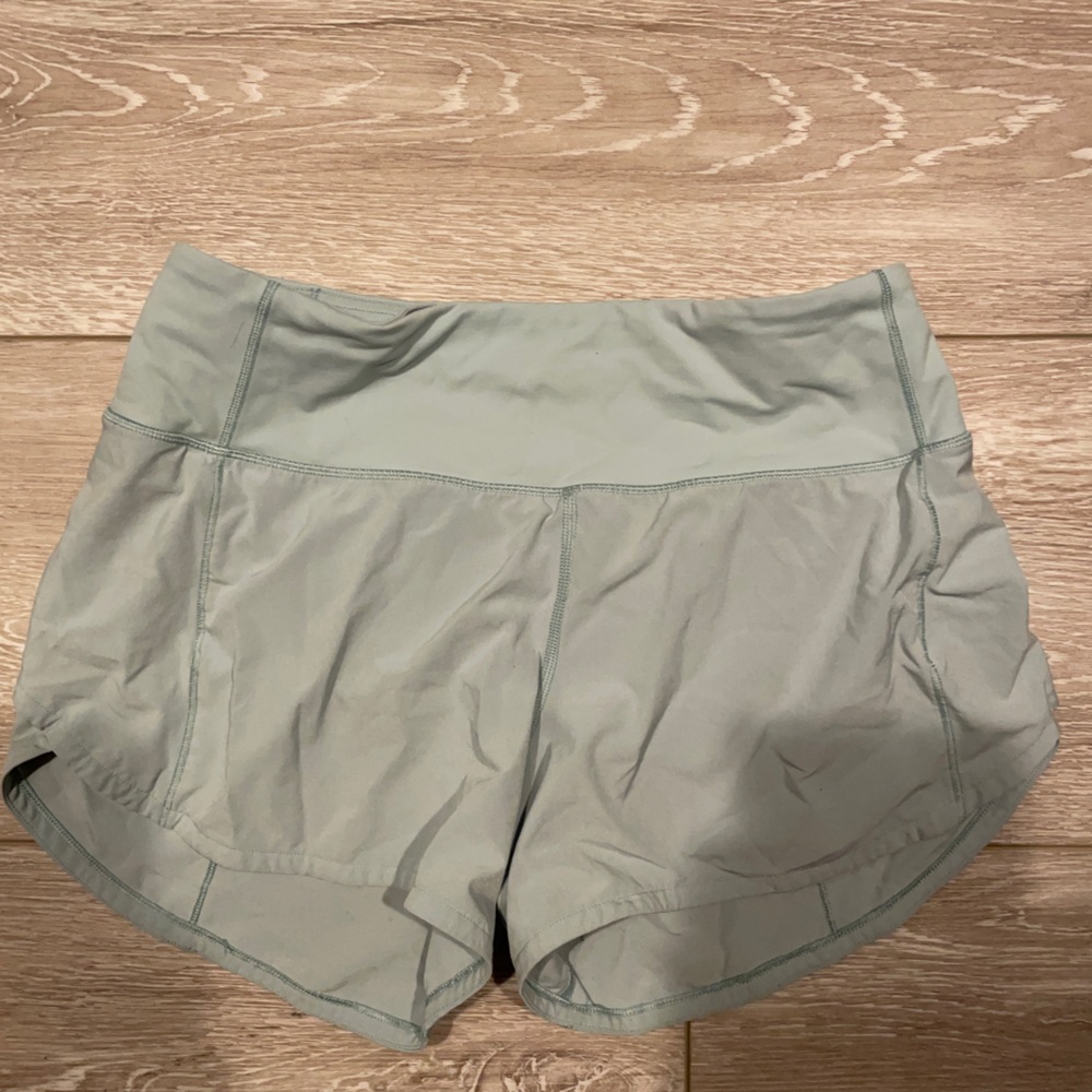 Lululemon speed up shorts in color teal
